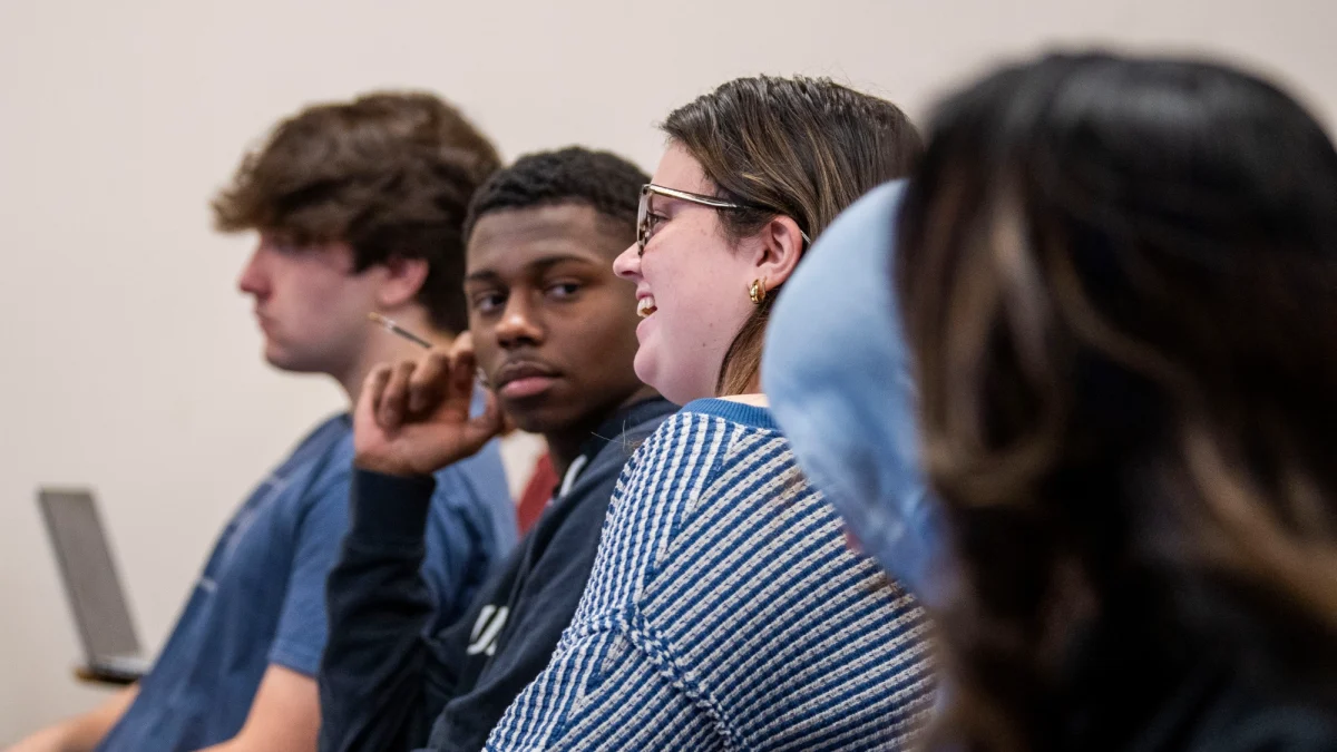 Students engaging in classroom conversation.